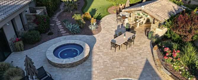 Benefits of Professional Landscape Design Services - A beautifully designed backyard with a pool, bbq and seating area